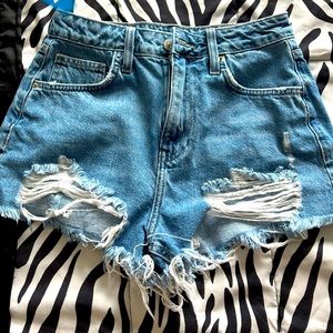 High waisted blue jean shorts